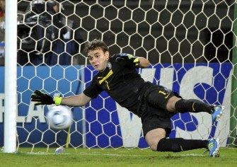 AFP - Brazil's Gabriel Vasconcelos catches a penalty kick during the quarterfinal football match against Spain AFP - Brazil's Gabriel Vasconcelos catches a penalty kick during the quarterfinal football match against Spain