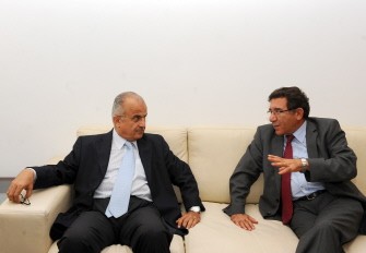 Former Jordanian Foreign Minister and United Nations' envoy for Libya, Abdul Ilah al-Khatib, speaks with Tunisian Secretary of State Radhouane Rouissi (R) during a meeting on August 15, 2011 in Tunis Former Jordanian Foreign Minister and United Nations' envoy for Libya, Abdul Ilah al-Khatib, speaks with Tunisian Secretary of State Radhouane Rouissi (R) during a meeting on August 15, 2011 in Tunis