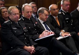 AFP - Acting Deputy Commissioner Tim Godwin (L) and Chief Constable Sir Hugh Orde (2nd L) listen as Home Secretary Theresa May delivering a speech on the need for police reform at the Institute of Civil Engineers in London on August 16, 2011 AFP - Acting Deputy Commissioner Tim Godwin (L) and Chief Constable Sir Hugh Orde (2nd L) listen as Home Secretary Theresa May delivering a speech on the need for police reform at the Institute of Civil Engineers in London on August 16, 2011