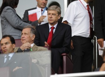 AFP - Aresnal manager Arsene Wenger watches the match from the directors box against Udinese AFP - Aresnal manager Arsene Wenger watches the match from the directors box against Udinese