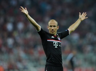 Bayern Munich's Dutch midfielder Arjen Robben celebrates scoring during the game Bayern Munich's Dutch midfielder Arjen Robben celebrates scoring during the game