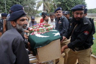 AFP - Pakistani policemen carry a coffin of a colleague killed in an overnight ambush by gunmen during a funeral ceremony in Karachi on 20, 2011 AFP - Pakistani policemen carry a coffin of a colleague killed in an overnight ambush by gunmen during a funeral ceremony in Karachi on 20, 2011