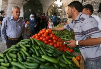 Palestinians shop in the Old City of Hebron on August 21, 2011 during Islam's holy month of Ramadan. Palestinians shop in the Old City of Hebron on August 21, 2011 during Islam's holy month of Ramadan.
