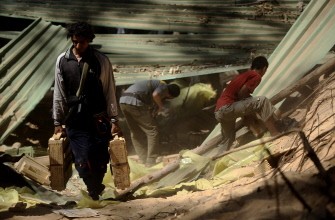 Libyan rebels seize boxes of ammunition hidden underground by Kadhafi's forces in the al-Maser forest in southern Tripoli on August 25, 2011. Libyan rebels seize boxes of ammunition hidden underground by Kadhafi's forces in the al-Maser forest in southern Tripoli on August 25, 2011.