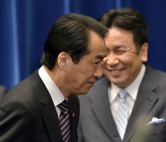 AFP- Japanese Prime Minister Naoto Kan leaves a press conference at his official residence in Tokyo on August 26, 2011, while Chief Cabinet secretary Yukio Edano (R) looks on. Kan announced his resignation as president of the Democratic Party. AFP- Japanese Prime Minister Naoto Kan leaves a press conference at his official residence in Tokyo on August 26, 2011, while Chief Cabinet secretary Yukio Edano (R) looks on. Kan announced his resignation as president of the Democratic Party.