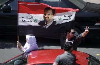 Syrians demonstrate in support of their President Bashar al-Assad in central Damascus on August 27, 2011 Syrians demonstrate in support of their President Bashar al-Assad in central Damascus on August 27, 2011