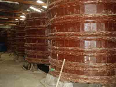 The place where fish sauce is made is called nha thung (house of barrels) because of the large wooden barrels in which the sauce is prepared (Photo: Ngoc Anh) The place where fish sauce is made is called nha thung (house of barrels) because of the large wooden barrels in which the sauce is prepared (Photo: Ngoc Anh)