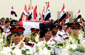 A handout picture released by the Syrian Arab News Agency (SANA) shows Syrian security forces carrying the coffin of Colonel Taysir al-Oqla, reportedly killed in recent violence in the country, during his funeral procession in the southern province of Daraa on September 28, 2011. A handout picture released by the Syrian Arab News Agency (SANA) shows Syrian security forces carrying the coffin of Colonel Taysir al-Oqla, reportedly killed in recent violence in the country, during his funeral procession in the southern province of Daraa on September 28, 2011.