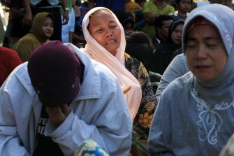 AFP - Relatives of some of the 18 passengers that were aboard the Casa 212 turboprop plane that crashed in Sumatra wait for news after a helicopter team flew out at Langkat, North Sumatra, on October 1, 2011. AFP - Relatives of some of the 18 passengers that were aboard the Casa 212 turboprop plane that crashed in Sumatra wait for news after a helicopter team flew out at Langkat, North Sumatra, on October 1, 2011.