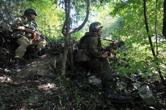 A photo taken on September 27, 2011, shows Russian OMON, riot police, officers during a patrol mission the Argun gorge in Chechnya A photo taken on September 27, 2011, shows Russian OMON, riot police, officers during a patrol mission the Argun gorge in Chechnya