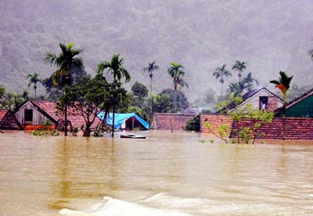 Severe flooding in Tan Hoa Commune, Minh Hoa District, Quang Binh Province (Photo: SGGP) Severe flooding in Tan Hoa Commune, Minh Hoa District, Quang Binh Province (Photo: SGGP)