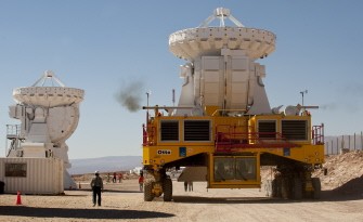 AFP - Technicians with large carriers prepare to set up one of the radio telescope antennas of the ALMA project on September 30, 2011. AFP - Technicians with large carriers prepare to set up one of the radio telescope antennas of the ALMA project on September 30, 2011.
