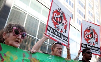 Medical marijuana advocates hold signs as they stage a demonstration in front of the Phillip Burton Federal Building on October 14, 2011 in San Francisco, California Medical marijuana advocates hold signs as they stage a demonstration in front of the Phillip Burton Federal Building on October 14, 2011 in San Francisco, California