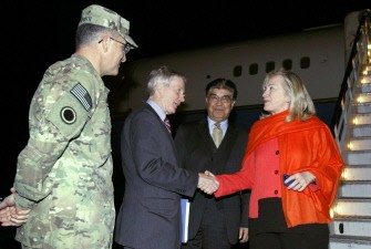 AFP - Afghan chief of protocol Hamid Saddiq (2nd R) and Lieutenant General Curtis Scaparotti (L) look at US Secretary of State Hillary Clinton (R) as she shakes hands with US Ambassador Afghanistan's Ryan Crocker (2nd L) upon her arrival in Kabul on October 19, 2011. AFP - Afghan chief of protocol Hamid Saddiq (2nd R) and Lieutenant General Curtis Scaparotti (L) look at US Secretary of State Hillary Clinton (R) as she shakes hands with US Ambassador Afghanistan's Ryan Crocker (2nd L) upon her arrival in Kabul on October 19, 2011.