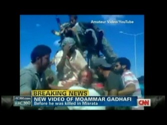 This still image from YouTube courtesy of CNN from October 20, 2011 shows the bloodied Libyan strongman Moamer Kadhafi, who was killed as new regime forces crushed the last pocket of resistance in his hometown Sirte, the National Transitional Council said. This still image from YouTube courtesy of CNN from October 20, 2011 shows the bloodied Libyan strongman Moamer Kadhafi, who was killed as new regime forces crushed the last pocket of resistance in his hometown Sirte, the National Transitional Council said.