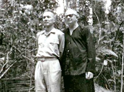 File photo of lawyer Nguyen Huu Tho, Chairman of the South Vietnam National Liberation Front Central Committee (L) and Australian journalist Wilfred Burchett File photo of lawyer Nguyen Huu Tho, Chairman of the South Vietnam National Liberation Front Central Committee (L) and Australian journalist Wilfred Burchett