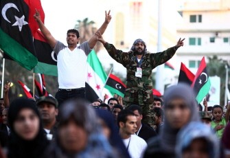 Libyans attend a celebration marking the Friday of Victory in Tripoli on October 28, 2011 a week after former strongman Moamer Kadhafi was captured and killed Libyans attend a celebration marking the Friday of Victory in Tripoli on October 28, 2011 a week after former strongman Moamer Kadhafi was captured and killed