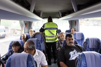 French gendarme checks the identity of bus passengers at a toll, on October 28, 2011 in La Turbie, near the Franco-Italian border, as part of security measures taken ahead of the G20 Summit of Cannes French gendarme checks the identity of bus passengers at a toll, on October 28, 2011 in La Turbie, near the Franco-Italian border, as part of security measures taken ahead of the G20 Summit of Cannes