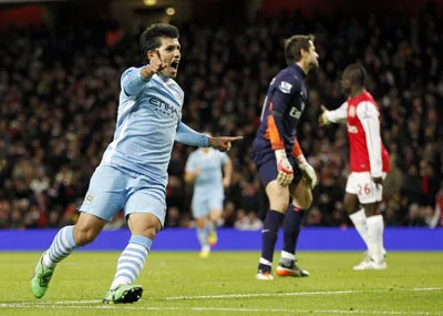 Niềm vui của tiền đạo Aguero - tác giả ghi bàn thắng duy nhất vào lưới Arsenal giúp Man.City lọt vào bán kết.