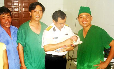 The baby after delivery on Truong Sa Lon Island The baby after delivery on Truong Sa Lon Island