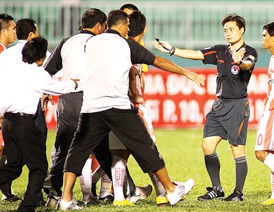 An image of violence in the football field An image of violence in the football field
