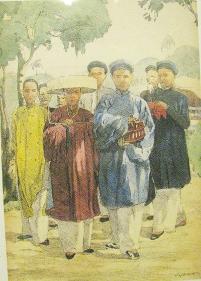 Costumes worn by people in the South of Vietnam at a wedding party dating 1934-1935 (Photo: SGGP) Costumes worn by people in the South of Vietnam at a wedding party dating 1934-1935 (Photo: SGGP)