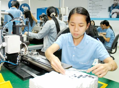 Workers in the Ho Chi Minh City based Danish FDI Sonion factory make telephone parts Workers in the Ho Chi Minh City based Danish FDI Sonion factory make telephone parts