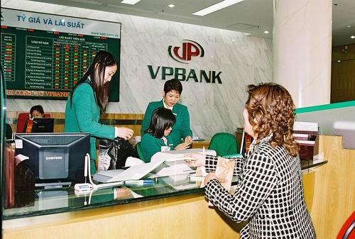 A customer makes a transaction at a branch of VPbank in HCMC A customer makes a transaction at a branch of VPbank in HCMC