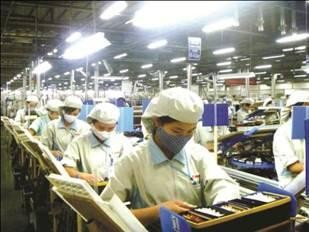A production line at Canon Vietnam (Photo: baohaiquan.vn) A production line at Canon Vietnam (Photo: baohaiquan.vn)