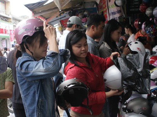Customers selecting their helmets