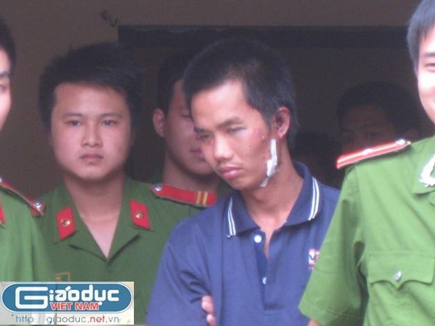 Dang Tran Hoai is being handed over to the local police Dang Tran Hoai is being handed over to the local police