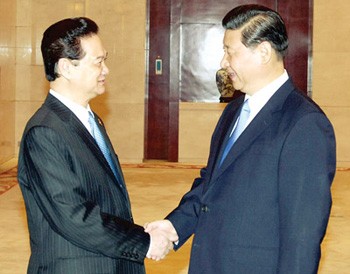 Vietnamese PM Nguyen TanDung shakes hands with Chinese Vice President Xi Jinping in Nanning on Sep. 20,2012. Vietnamese PM Nguyen TanDung shakes hands with Chinese Vice President Xi Jinping in Nanning on Sep. 20,2012.