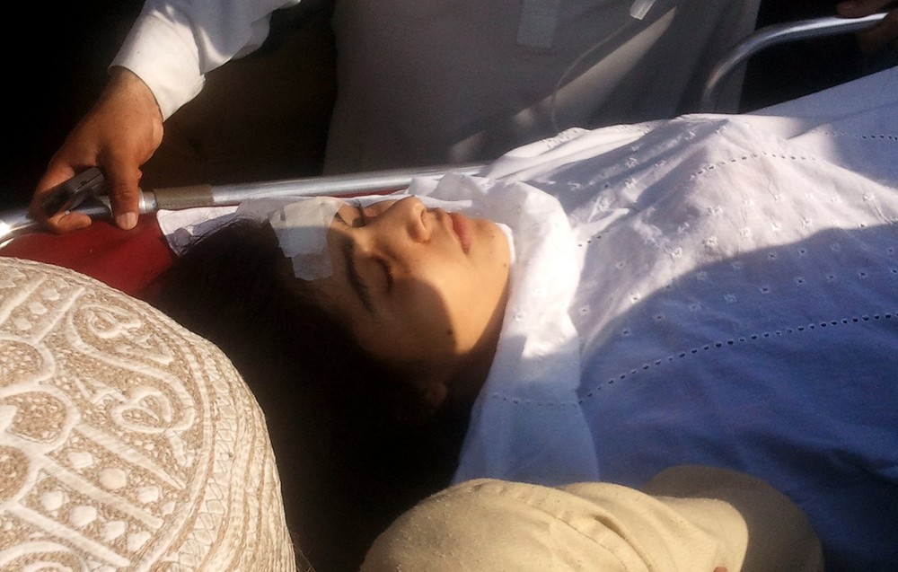 A wounded Pakistani girl, Malala Yousufzai, is moved to a helicopter to be taken to Peshawar for treatment in Mingora, Swat Valley, Pakistan on Tuesday, Oct. 9, 2012. A wounded Pakistani girl, Malala Yousufzai, is moved to a helicopter to be taken to Peshawar for treatment in Mingora, Swat Valley, Pakistan on Tuesday, Oct. 9, 2012.