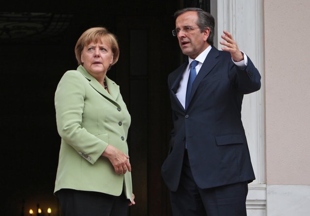 Greece's Prime Minister Antonis Samaras, right, and Germany's Chancellor Angela Merkel speak before their meeting at the Maximos mansion in Athens, Tuesday, Oct. …more 9, 2012. Greece's Prime Minister Antonis Samaras, right, and Germany's Chancellor Angela Merkel speak before their meeting at the Maximos mansion in Athens, Tuesday, Oct. …more 9, 2012.