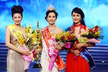 Miss Vietnam 2012, Dang Thu Thao (C), first runner-up Duong Tu Anh (L) and second runner-up Do Hoang Anh. Miss Vietnam 2012, Dang Thu Thao (C), first runner-up Duong Tu Anh (L) and second runner-up Do Hoang Anh.