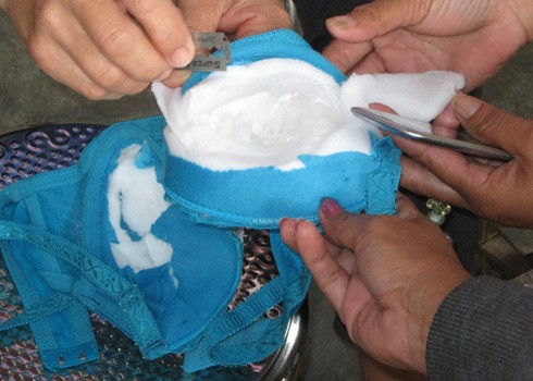 Chinese made bras are found to have strange pills and liquid packets embedded in their cups Chinese made bras are found to have strange pills and liquid packets embedded in their cups