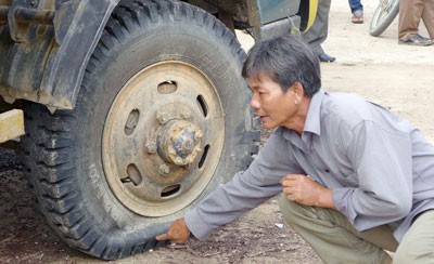 Duong Ruou Em said the bodyguards punctured his truck tyres Duong Ruou Em said the bodyguards punctured his truck tyres