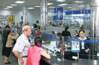 Dealing at ACB Bank (Photo: SGGP) Dealing at ACB Bank (Photo: SGGP)