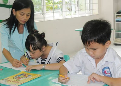 Young students at a special school in District 10 in HCMC (Photo: SGGP) Young students at a special school in District 10 in HCMC (Photo: SGGP)