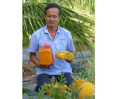 Farmer Nam Liem with his exclusive car-shaped watermelon Farmer Nam Liem with his exclusive car-shaped watermelon
