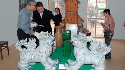 They save most of their money for their work and for constructing a unique museum of porcelain in the village