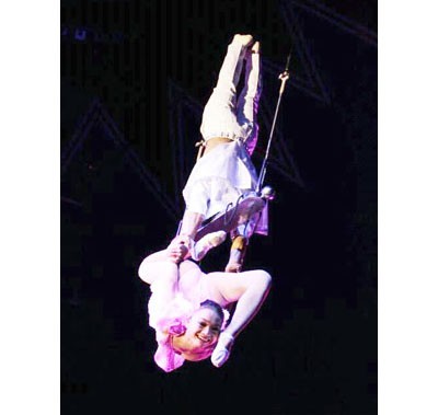 Acrobats Hoang Anh and Thu Hiep perform the flying trapeze act at the festival in Spain Acrobats Hoang Anh and Thu Hiep perform the flying trapeze act at the festival in Spain