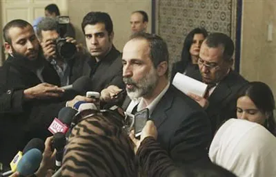 Ông Moaz al-Khatib tuyên bố từ chức. Ông Moaz al-Khatib tuyên bố từ chức.