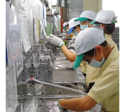 Production workers at a FDI company in Tan Thuan Export Processing Zone in HCMC (Photo: SGGP) Production workers at a FDI company in Tan Thuan Export Processing Zone in HCMC (Photo: SGGP)