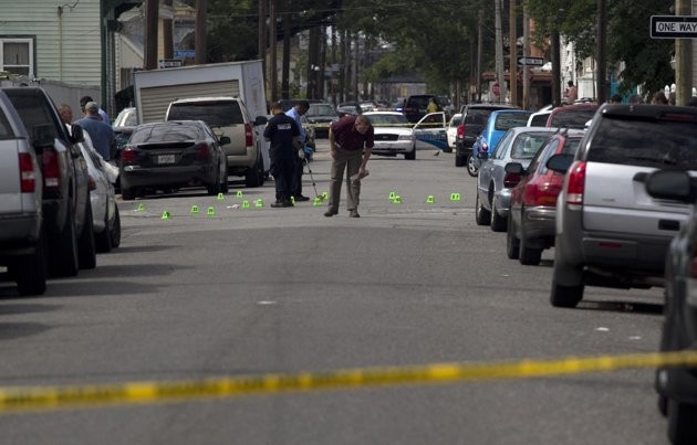New Orleans Police investigate shooting at the intersection Frenchman Street at N. Villere on Mother's Day in New Orleans, Sunday May 12, 2013. New Orleans Police investigate shooting at the intersection Frenchman Street at N. Villere on Mother's Day in New Orleans, Sunday May 12, 2013.