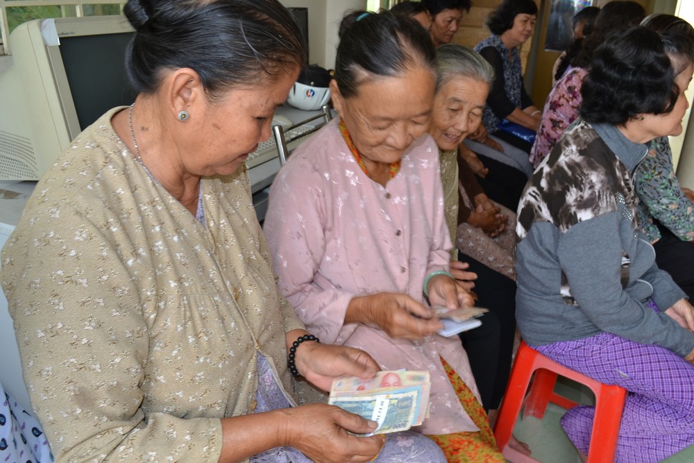 Elderly pensioners receiving their allowance