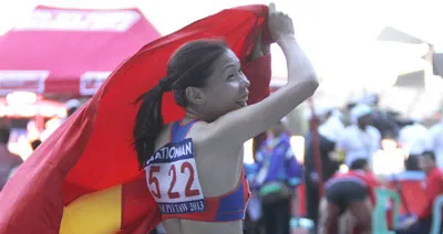 "Nữ hoàng tốc độ" Vũ Thị Hương vào chung kết 200m nữ. Ảnh: TTX "Nữ hoàng tốc độ" Vũ Thị Hương vào chung kết 200m nữ. Ảnh: TTX