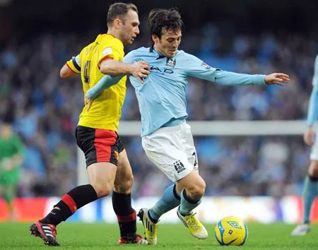 David Silva (phải, Man.City) trong nỗ lực thoát qua John Eustance (Watford) ở trận thắng 3-0 hơn 1 năm trước. David Silva (phải, Man.City) trong nỗ lực thoát qua John Eustance (Watford) ở trận thắng 3-0 hơn 1 năm trước.