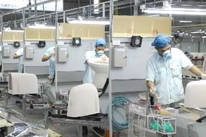 Production at Japanese-invested Inax Viet Nam Company (Photo: VNA) Production at Japanese-invested Inax Viet Nam Company (Photo: VNA)