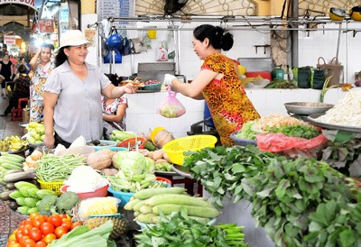A stall of domestic vegetables coming under VietGap quality standard, Ben Thanh Market, HCMC (Photo: SGGP) A stall of domestic vegetables coming under VietGap quality standard, Ben Thanh Market, HCMC (Photo: SGGP)